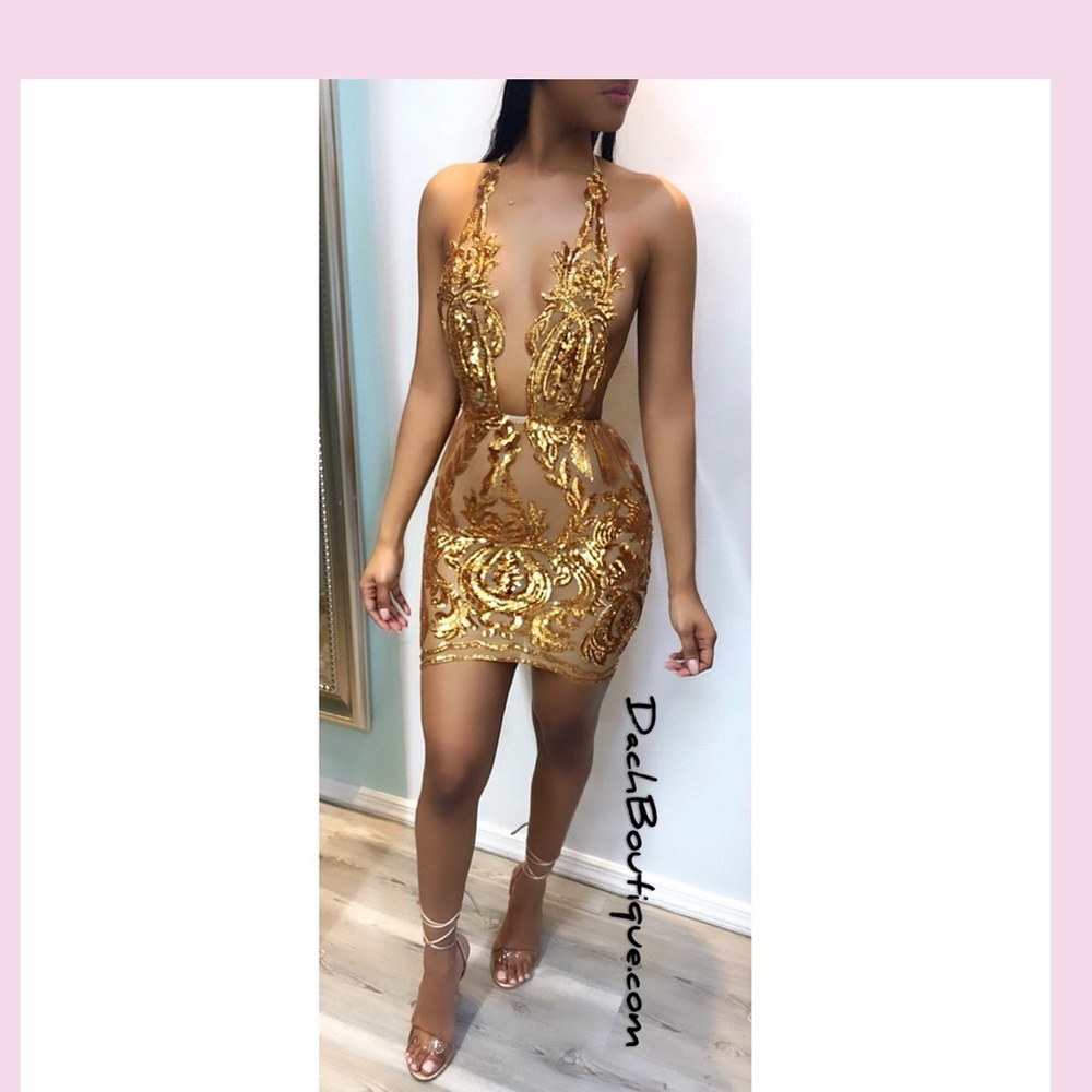 A gold mesh lace dress